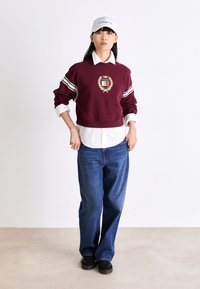 Tommy Jeans Traperice opuštenog kroja - denim dark