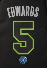 Black sports jersey with a textured finish, featuring the name "EDWARDS" in white and the number "5" outlined in neon green, with a team logo below.