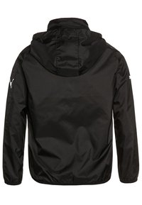 Black waterproof jacket with a hood, featuring a smooth texture, elastic cuffs, and a white logo on the left shoulder. Simple design.