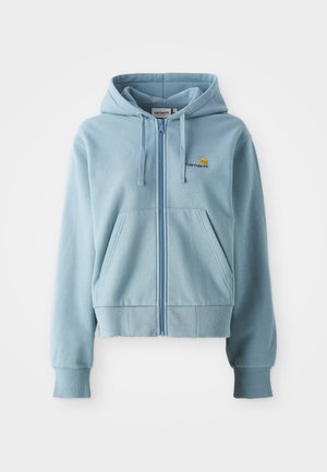 Light blue zip-up hoodie made of soft fabric, featuring a drawstring hood, kangaroo pockets, and embroidered logo on the chest.