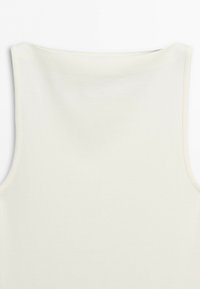 White sleeveless top with a high boat neckline and smooth fabric texture shown from the front.