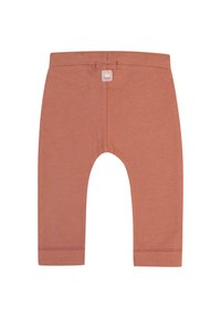 Dziewczęce legginsy w delikatnym, rdzawym kolorze, wykonane z elastycznej bawełny, z elastycznym paskiem w talii i stębnowanymi detalami na krawędziach.