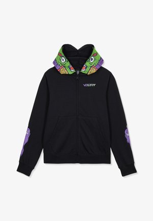 Hoodie noir à fermeture éclair avec un design coloré de visage de monstre à l'intérieur de la capuche, petit logo sur la poitrine et personnages de dessin animé violets sur les manches.