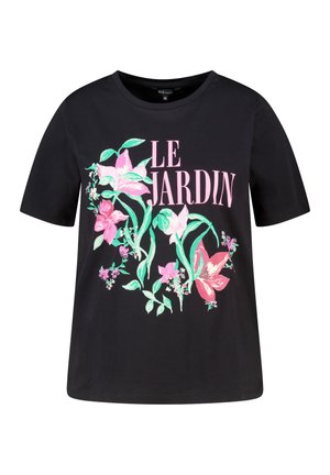 T-shirt noir à manches courtes avec un motif floral rose et vert et le texte "LE JARDIN" en grandes lettres roses sur le devant.