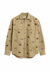 Camicia khaki con bottoni e due tasche sul petto, caratterizzata da motivi di cani ricamati in vari colori su tutta la stoffa. Materiale in cotone, vestibilità rilassata.