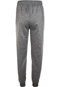 Grå sweatpants gjorda av mjukt tyg, med elastisk midja, muddade anklar och en melerad struktur. Enkelt mönster, inga synliga fickor.