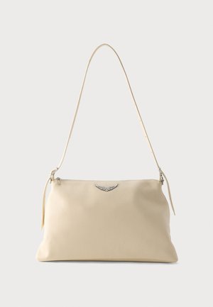 Cream-colored leather shoulder bag with a silver winged emblem and a thin strap against a plain background.