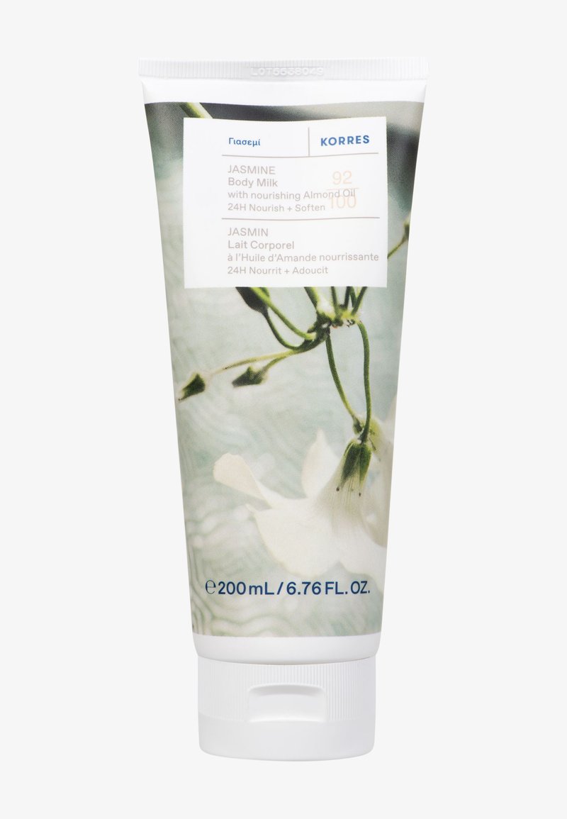 Tubetto di Latte per il Corpo Korres al Gelsomino, 200ml, caratterizzato da un design floreale morbido in bianco e verde, materiale plastico e un tappo a ribalta per il dosaggio.