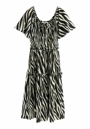Black and white zebra-striped dress with short flutter sleeves, smocked bodice, and tiered ruffle design. Made of lightweight fabric.