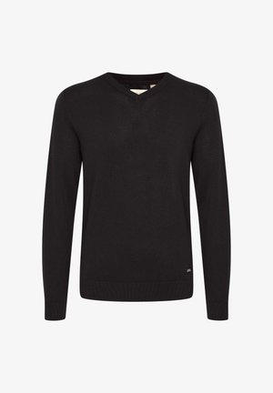 Must must-särg, mis on valmistatud siledast kootud kangast. Pika varrukaga ja peene mansetiga. Diskreetne logo detail hemil. Klassikaline siluett.