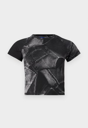 Black short-sleeve t-shirt featuring a large denim print with pockets and seams, made from cotton blend fabric with a textured finish.