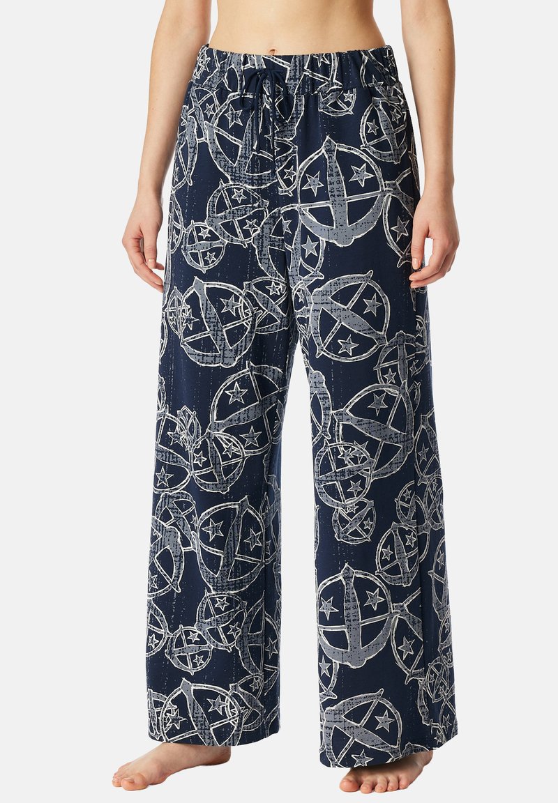 Marineblauwe wijde broek van lichtgewicht stof met een witte ster- en wereldbolprint. Elastische tailleband met een koorddetail.