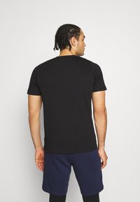 Puma SMALL LOGO  - Paprasti marškinėliai - puma black cat