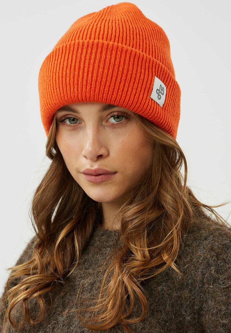 Moves HATTAS Berretto orange peel/arancione Zalando.it