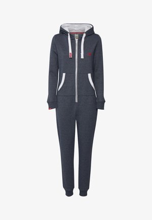 Tumedat sinised tõmblukuga ülikond kapuutsiga, valgete aksentide, ees olevate taskute ja pehme tekstuuriga. Omab kontrastset sisekujunduse värvi.