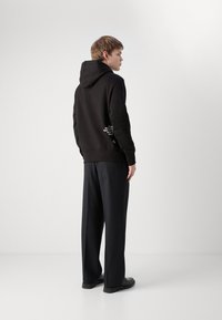 Calvin Klein Jeans 1978 HOODIE - Jersey con capucha - black