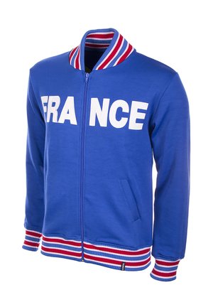 Blaues Reißverschlussjacke mit "FRANCE" in weißen Buchstaben, rot-weiß-blau gestreiftem Kragen, Bündchen und Saum, mit Seitentaschen.