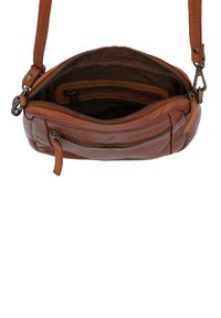 Brown leather crossbody bag with a zippered main compartment, interior pockets, and an adjustable strap. Textured finish with stitching details.