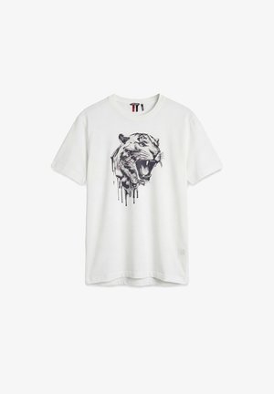 Camiseta blanca de manga corta con un gráfico de la cabeza de un tigre rugiente que parece derretirse o gotear en un estilo de tinta negra.