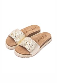 Gold metallic slide sandals with a knotted strap detail, suede footbed, and a woven jute midsole. Lightweight and casual design.