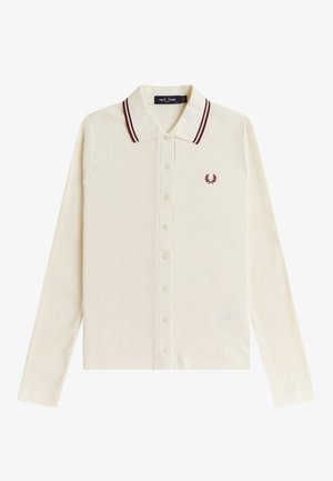 Polo de manga larga en color crema con textura acanalada, botones delanteros, rayas burdeos de contraste en el cuello y logo bordado de corona de laurel en el pecho.