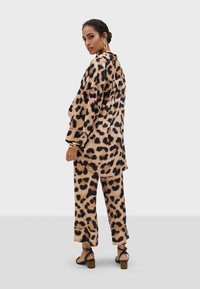 LOLA CASADEMUNT Paitapusero - leopard