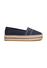 Tengerészkék vászon espadrille, juta kötél talppal, kerek orral és kontrasztos varrással, amely ideális a hétköznapi viselethez.