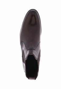 Brązowy skórzany botek za kostkę o błyszczącym wykończeniu, z zakrzywionym czubkiem i falbaniastej krawędzi. Posiada elastyczne panele boczne i teksturowaną piętę.