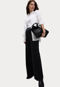 Marks & Spencer Kalhoty - black