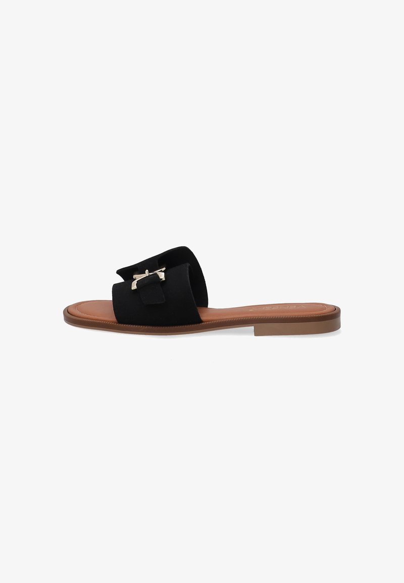 Black suede slide sandals with a two-strap design, featuring a metallic accent. Tan leather insole and flat, brown rubber sole.