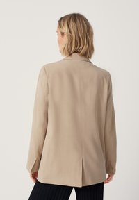 someday. Manteau court - beige