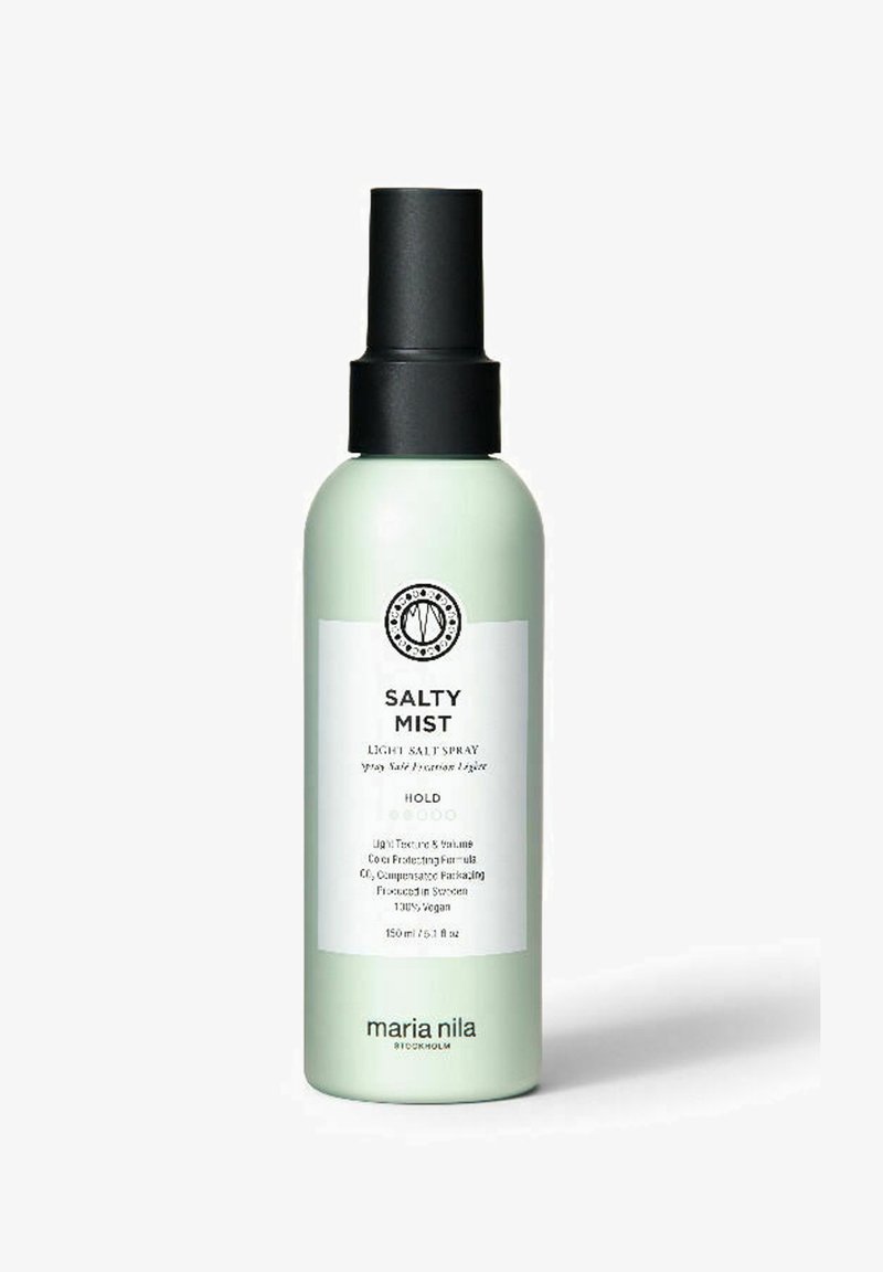 Lichte zoutnevel in een matte mintgroene fles met een zwarte pomp, voorzien van een wit label met zwarte tekst en een cirkelvormig logo. 150 ml.