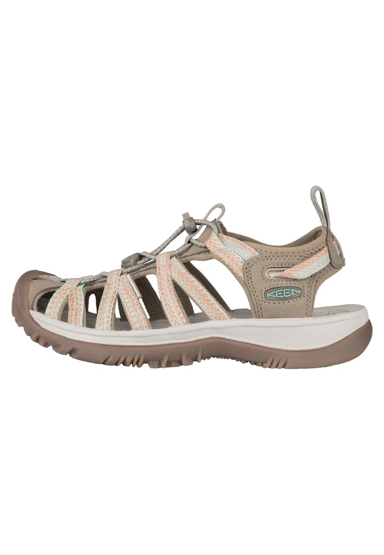Brown and beige sandal with elastic straps, textured sole, adjustable drawstring, and a cushioned footbed. Logo on the side.