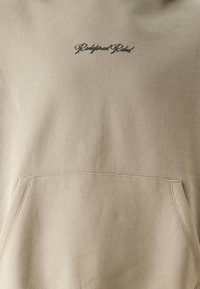 Redefined Rebel Hoodie - string