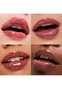 Four close-up images of lips showcasing various shades of glossy nude lipstick. Lips appear full, with smooth texture and subtle highlights.
