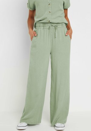 WIDE - Stoffhose - light green