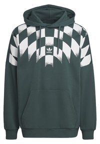 Mörkgrön Adidas-huvtröja med vitt geometriskt bågmönster över bröstet och axlarna, framfickficka och snölina i huvan.