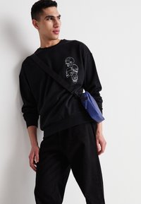 Jack & Jones JJSCULLY CREW NECK - Sweatshirt - black