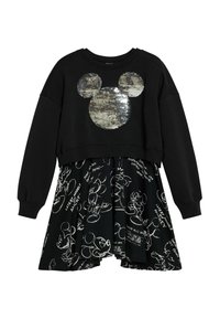 Schwarzes Langarmkleid mit einem glänzenden, paillettenbesetzten Mickey-Maus-Kopf an der Oberseite und weißen, skizzenhaften Mickey-Maus-Drucken auf dem Rock.