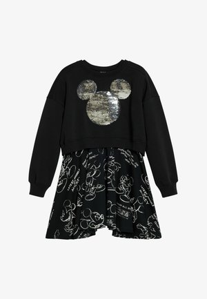 Schwarzes Langarmkleid mit einem glänzenden, paillettenbesetzten Mickey-Maus-Kopf an der Oberseite und weißen, skizzenhaften Mickey-Maus-Drucken auf dem Rock.