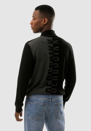 A MANICHE LUNGHE - Polo - nero