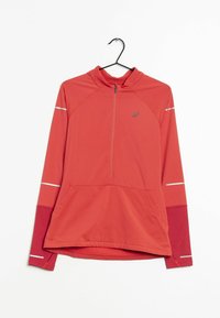 Röd långärmad tröja i mjukt tyg med halvlång dragkedja vid halsen, framficka och reflexband på ärmarna.