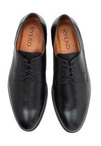 Czarne skórzane eleganckie buty o gładkim wykończeniu, sznurowane, z zaokrąglonym noskiem. Wnętrze wyposażone w jasnobrązową miękką wkładkę.