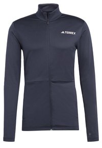 Ciemnoniebieska kurtka Terrex z wysokim kołnierzem, długimi rękawami i zapięciem na zamek z przodu. Wykonana z gładkiego, lekkiego materiału; posiada logo na klatce piersiowej.