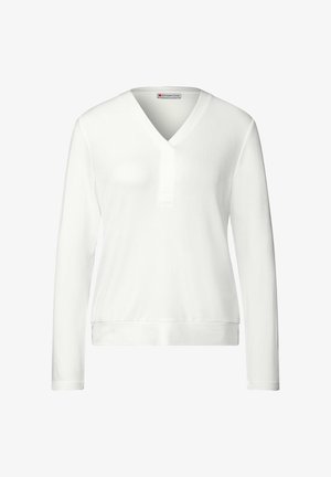 Weißes Langarmoberteil mit V-Ausschnitt und einem Knopfdetail am Kragen. Weicher Stoff, taillierte Passform mit elastischem Bund.
