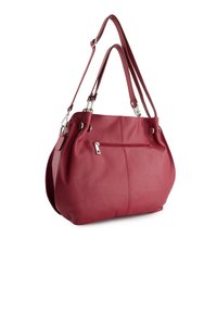 Red leather shoulder bag with a textured finish, two straps, silver hardware, and a zippered pocket on the front.