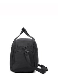 Sac à dos noir, rectangulaire, fabriqué en tissu résistant. Dispose d'une sangle d'épaule réglable, d'une poignée supérieure et d'une poche zippée à l'avant.