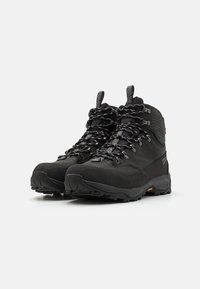 Schwarze Wanderschuhe mit einer strukturierten Oberseite, verstärkter Zehenpartie und flexibler Gummisohle. Sie verfügen über stabile Schnürsenkel und einen gepolsterten Schaft für zusätzlichen Halt.