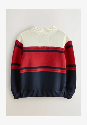 Kootud sviiter, millel on kreemivalge, punase ja meresinise triibuline disain. Tekstureeritud kangas ribaga mansettide ja kraega. Klassikaline ümar kaelus.