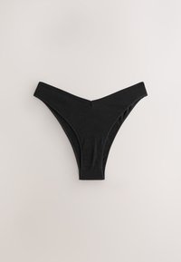 Mustat puuvillaiset stringit, joissa on V-muotoinen vyötärönauha, vähäinen peittävyys ja saumattomat reunat mukavuutta varten. Yksinkertainen ja toimiva muotoilu.